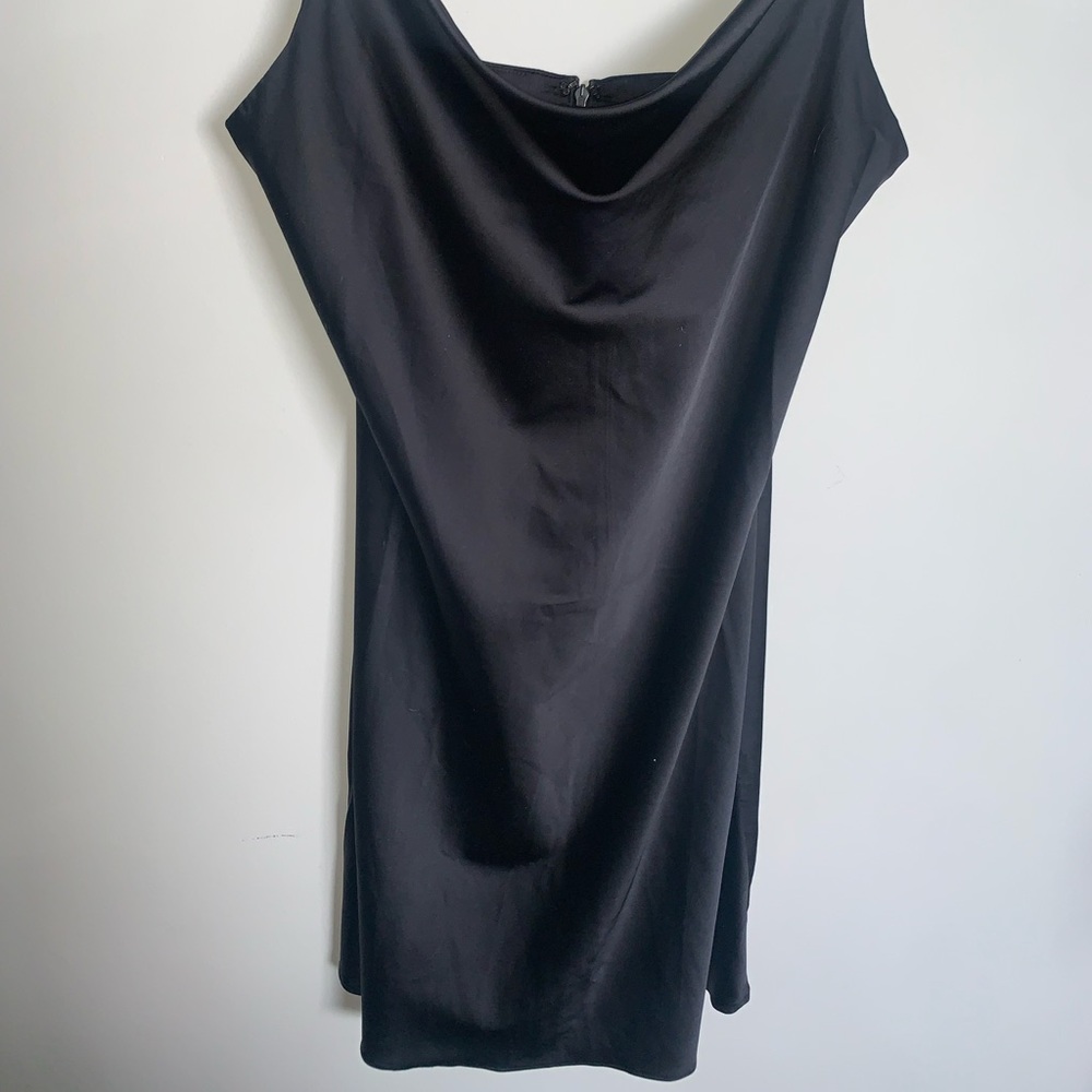 Simon’s little black satin scoop neck dress
